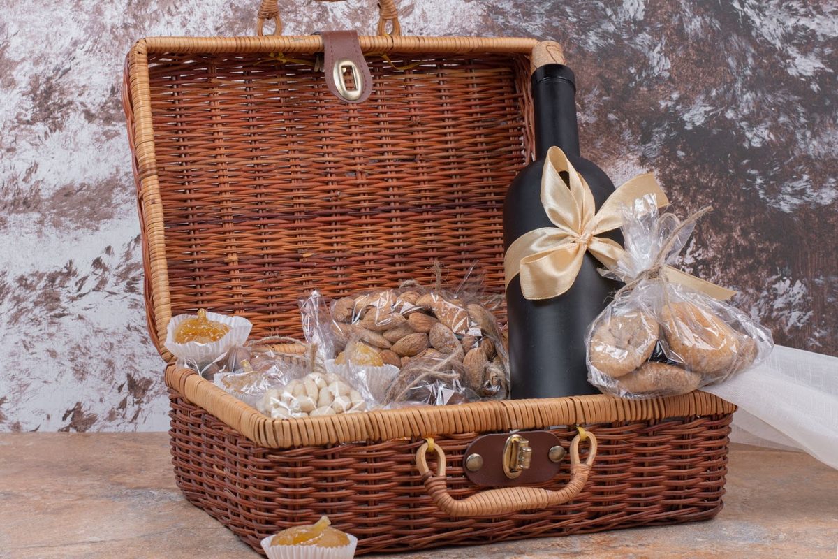 Gift basket of dried fruits and nuts with a bottle of wine