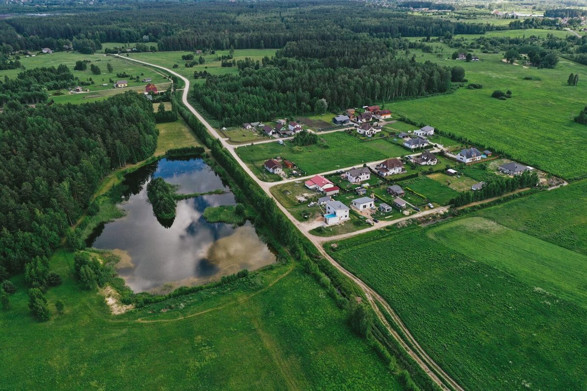 Aerial drone view of a village and surrounding countryside