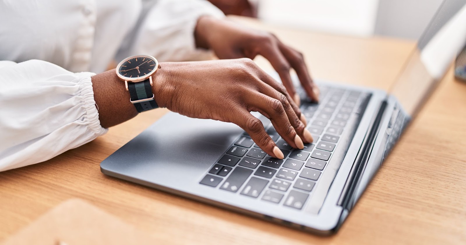 Business worker using a laptop in an office