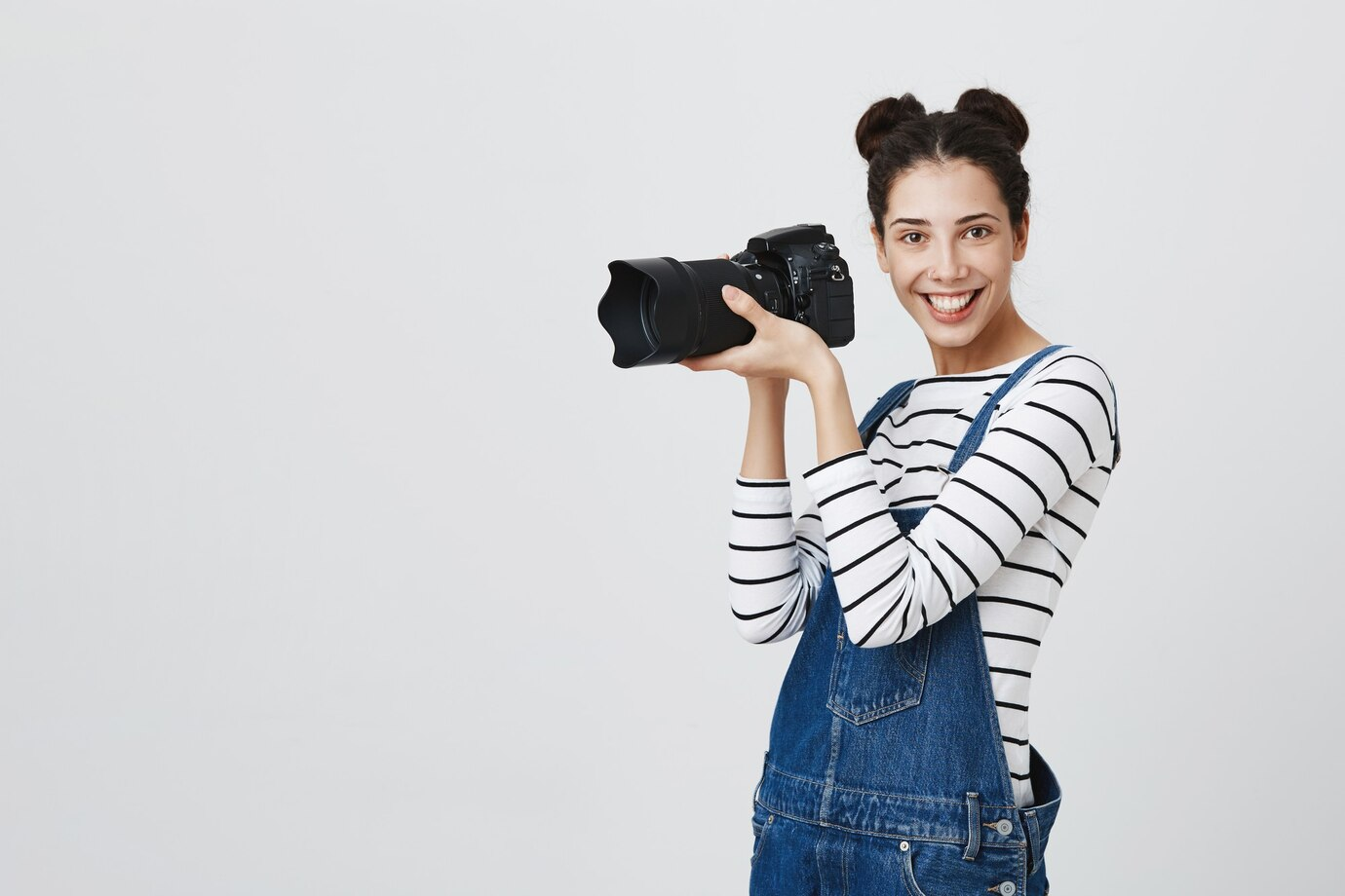 Photographer taking pictures with a camera