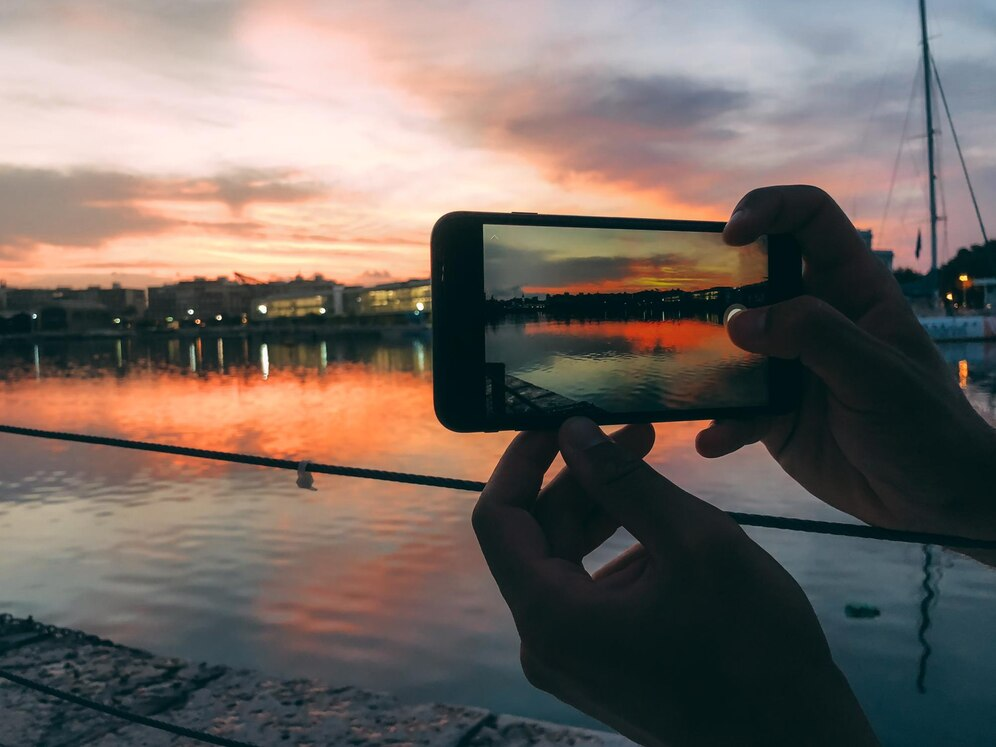 Person taking a photo with a smartphone