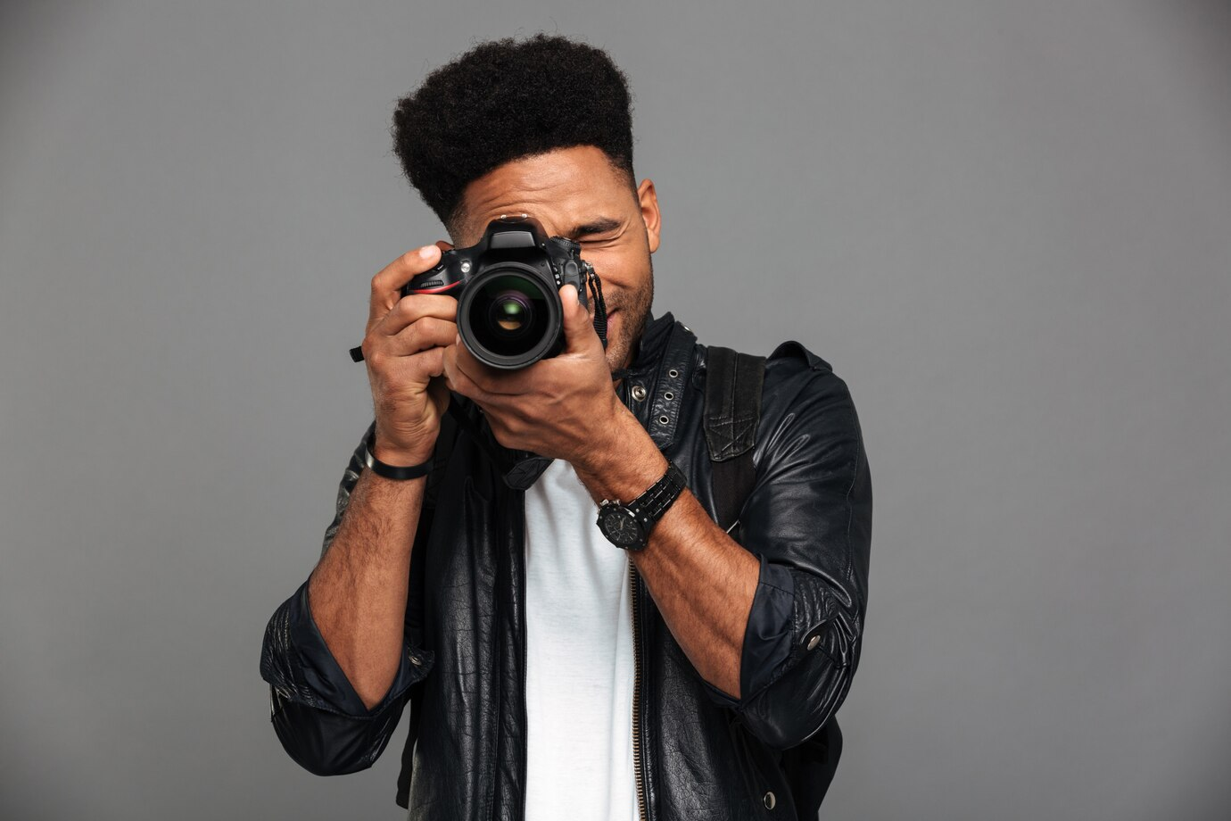 Photographer using a digital camera