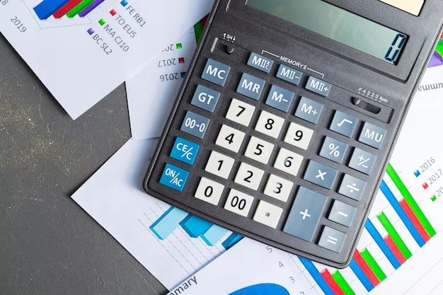 Accounting report and calculator on a business table