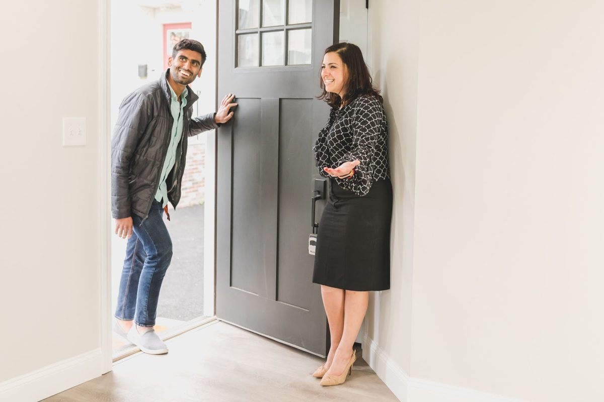 Real estate professionals reviewing documents together