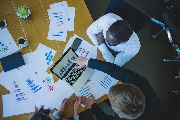 Top view of a business team meeting around a table