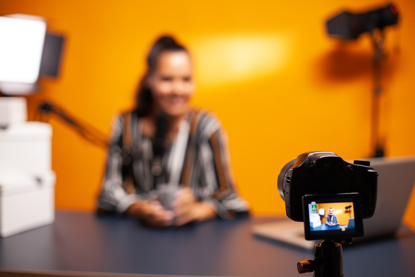 Camera recording videoblog in home studio