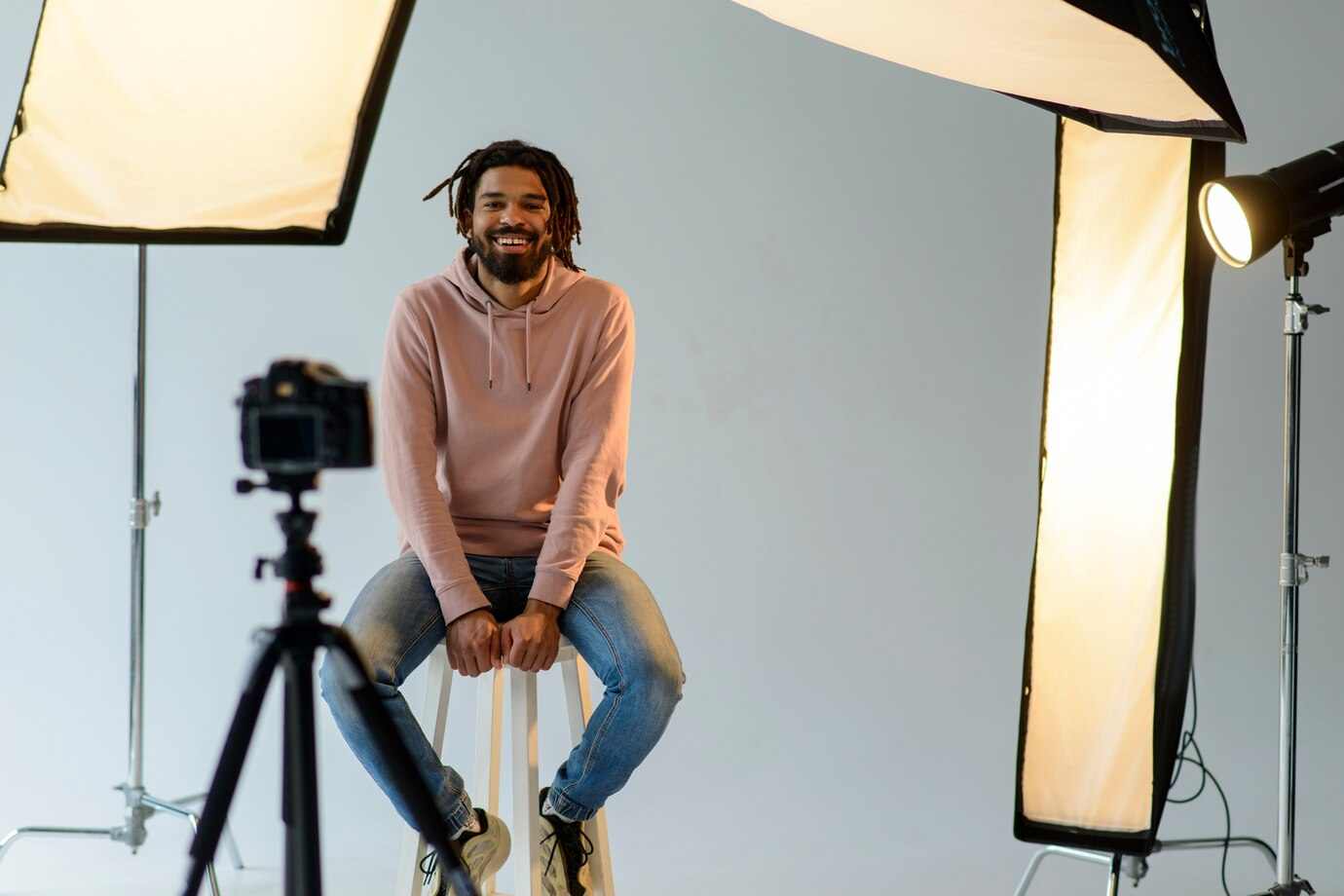 Man sitting in chair for clean stable shot