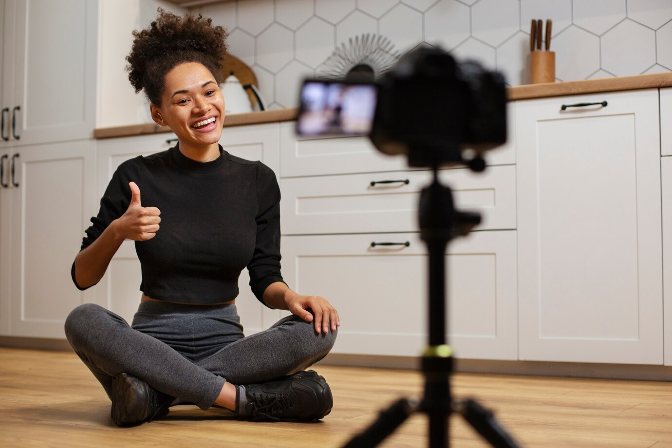 Smiley woman with video camera